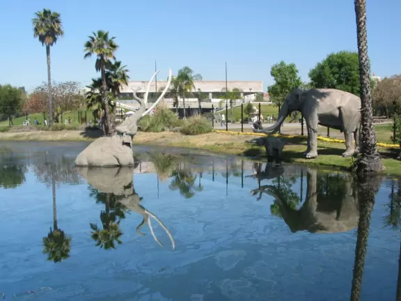 The pool of oil, and sculptures of mastodons.