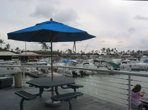 A picnic table by the water at Koko Marina.