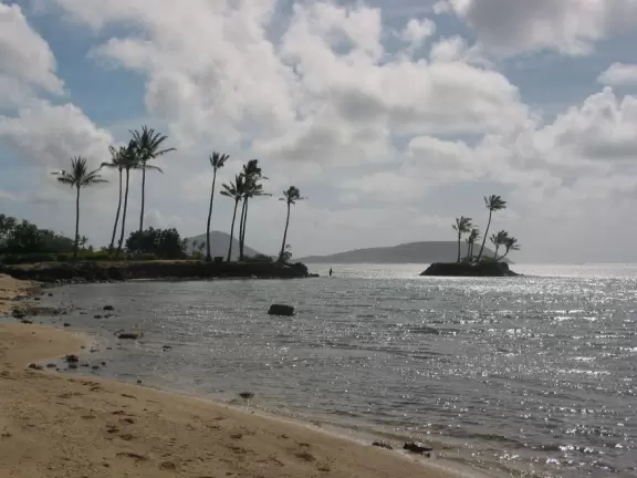 The little island of Kahala Resort, as seen from Waialae Beach Park.