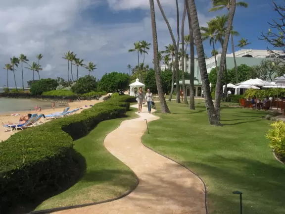 Winding walkway to the wedding gazebo. There are lovely lawns with hammocks at Kahala Resort.