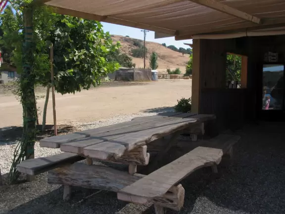 A shady spot to sit, at the front booth. 