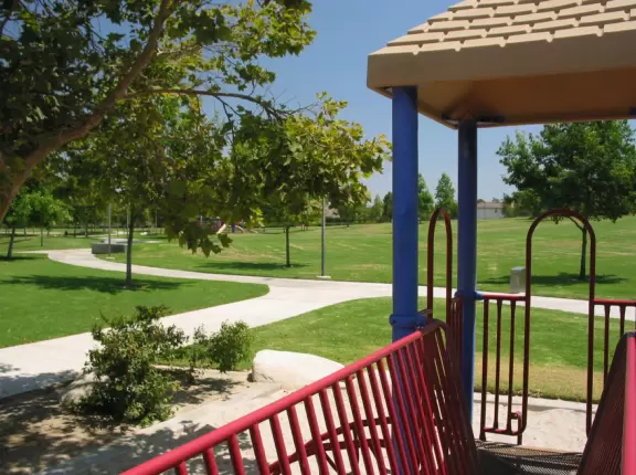 The little kids play structure with winding paths behind.