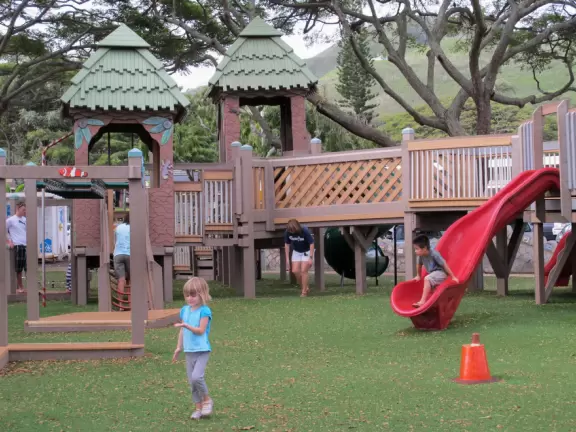 Bridges, slide, more monkey bars. See Aikahi's hills behind.