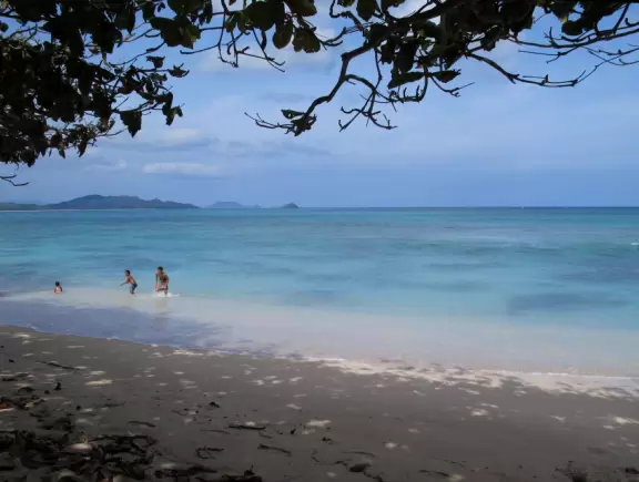 Kids swimming at the southern end of Waimanalo Beach.