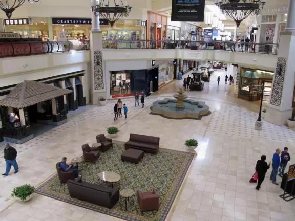 Couches and Spanish fountain on the first level.