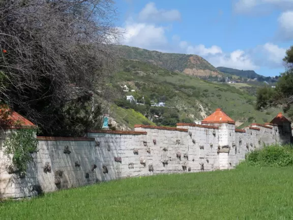 The yard and wall inlaid with stone.