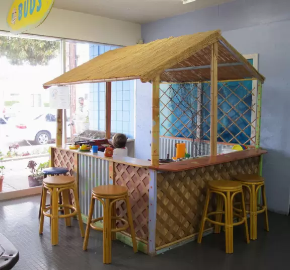 Hawaiian snack shack where parents can sit on the stools and be served by their kids!