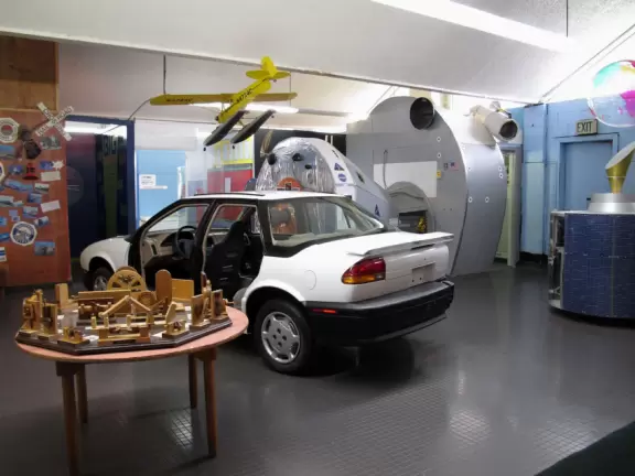 See inside the doors and hood of a car.