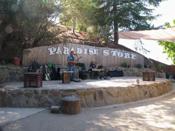 The stage in the back of Paradise Store and Grill.