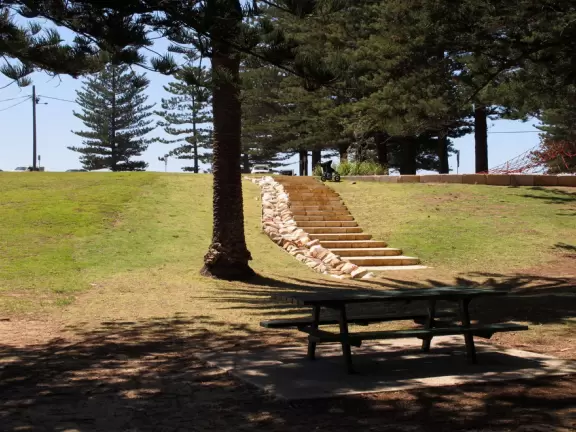 Picnic table and sandstone stairs.
