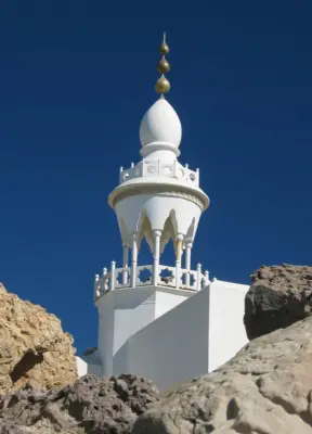Details of a spire on the Isham Poolhouse- you can't see much of the house because of the large seawall that fronts the property.