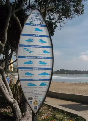 Sign displaying "Surfers Code: Give respect to gain respect."