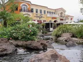 A row of eateries on the west side of the mall, with wonderful fountains and statutes to keep kids entertained.
