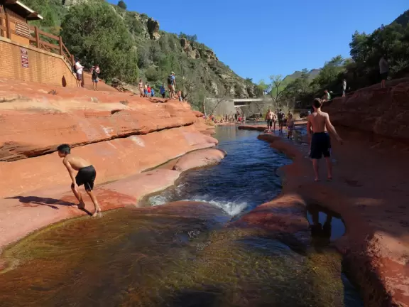 A paradise where you can slide down natural rock slides, in exquisite Oak Creek Canyon.
