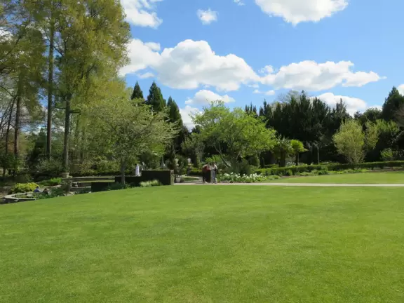 Large world-class garden with lakeside allees, flower terraces, and small Japanese garden.