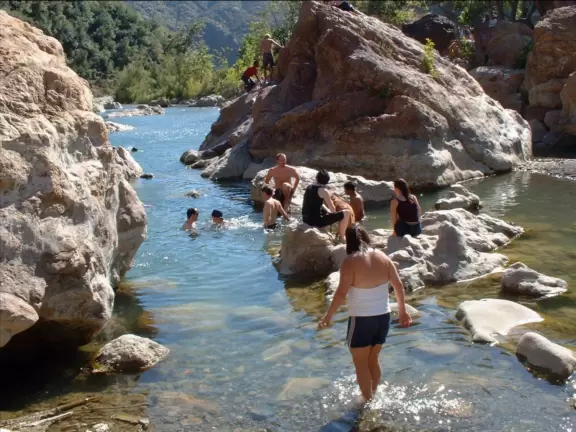 Deep swimming holes where red rocks loom gloriously above.
