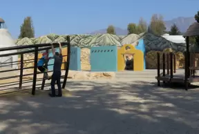 The sandy part of the playground.