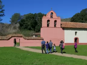 A family visits the mission.