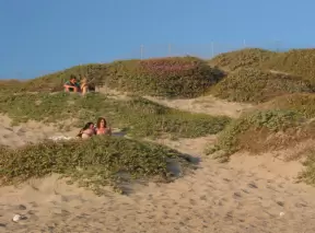 Cute couples on the dunes at Coal Oil Point on a warm summer evening.
