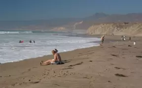 People hanging out on the beach.