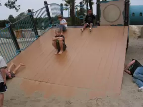 Kids having fun on the slippery slide.