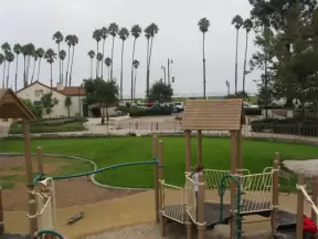 You can see the ocean and the tree-lined boardwalk from the top of the playground!