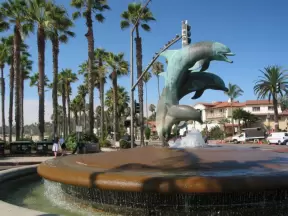 The famous dolphin fountain at the base of the pier.
