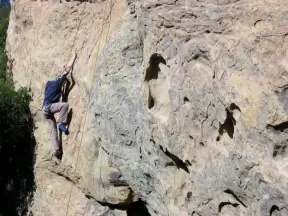 Climbing the 5.9 wall (very difficult) at Playgrounds!