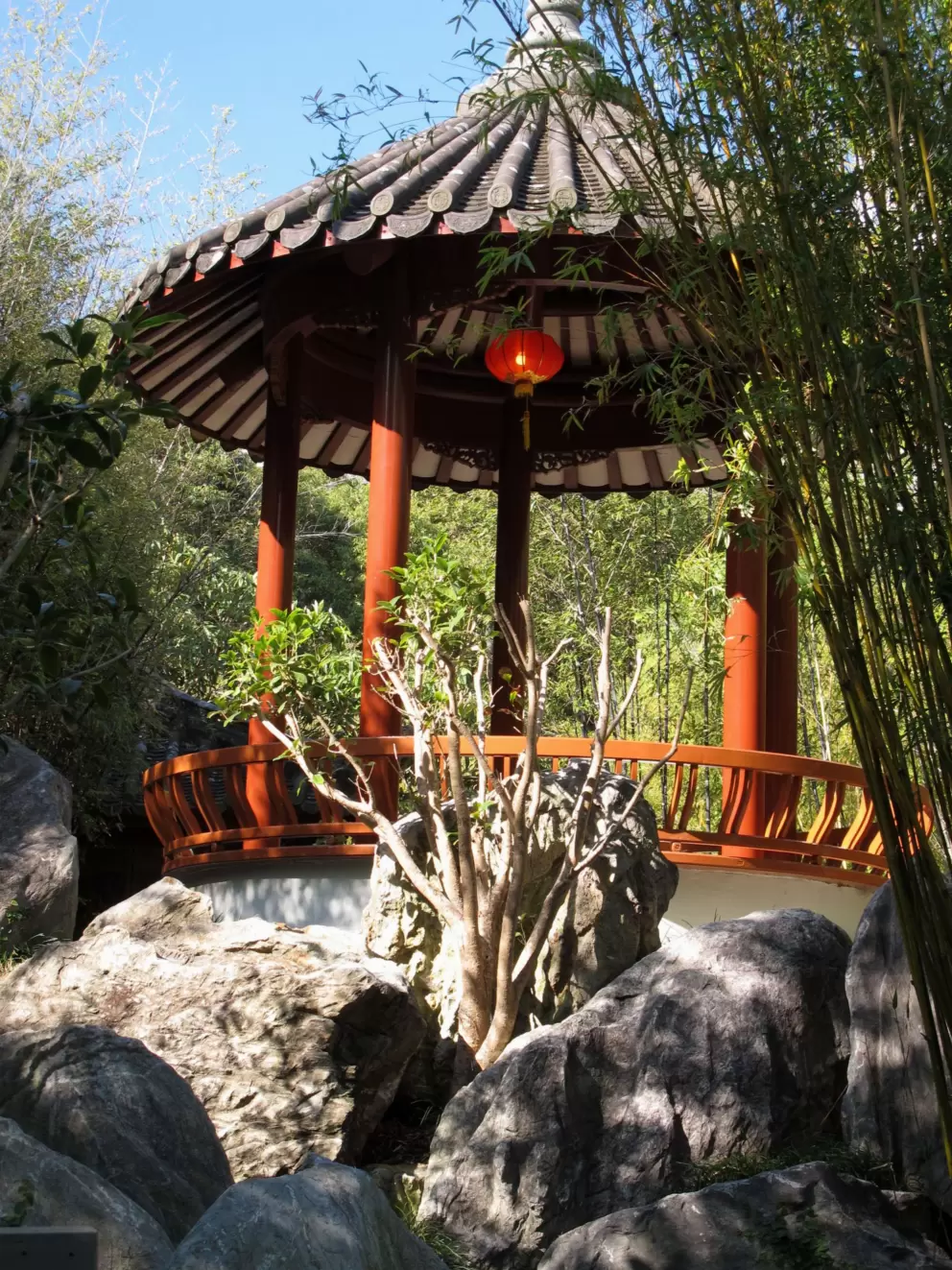 Romantic little gazebo up high over the garden.