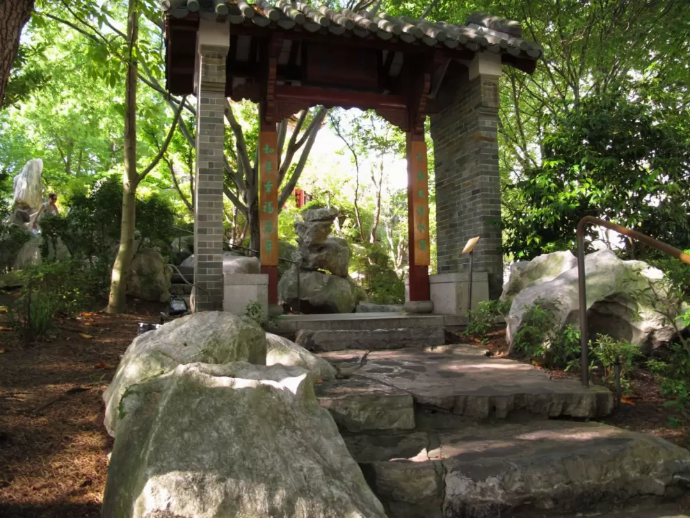 Serene foliage and archway.