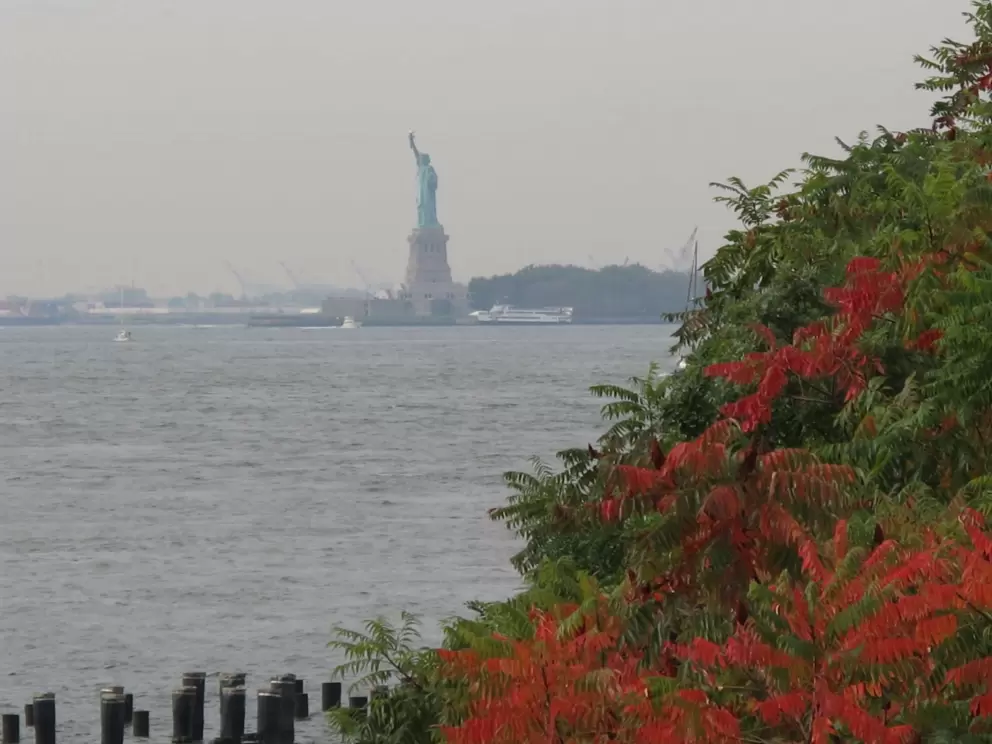 The Statue of Liberty, as seen from Brooklyn Bridge Park.