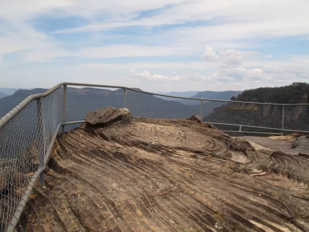 Nature carved waves in the rock at Tarpeian Rock Lookout.