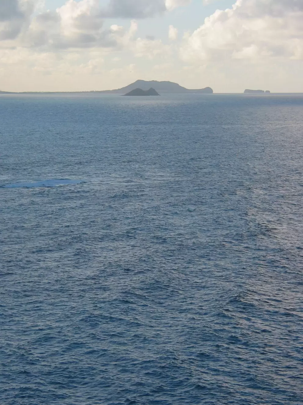 Views of Turtle Head and Chinaman's Hat at dusk.