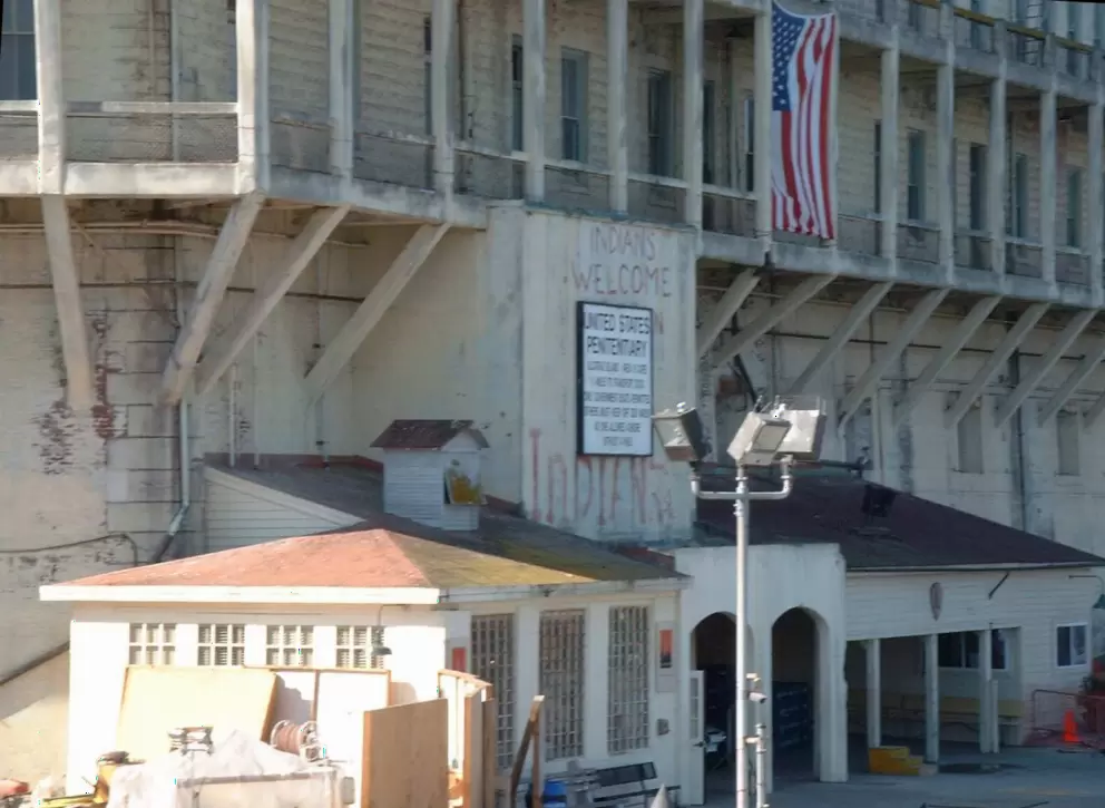 The historical sign at the dock that says "Indians Welcome."