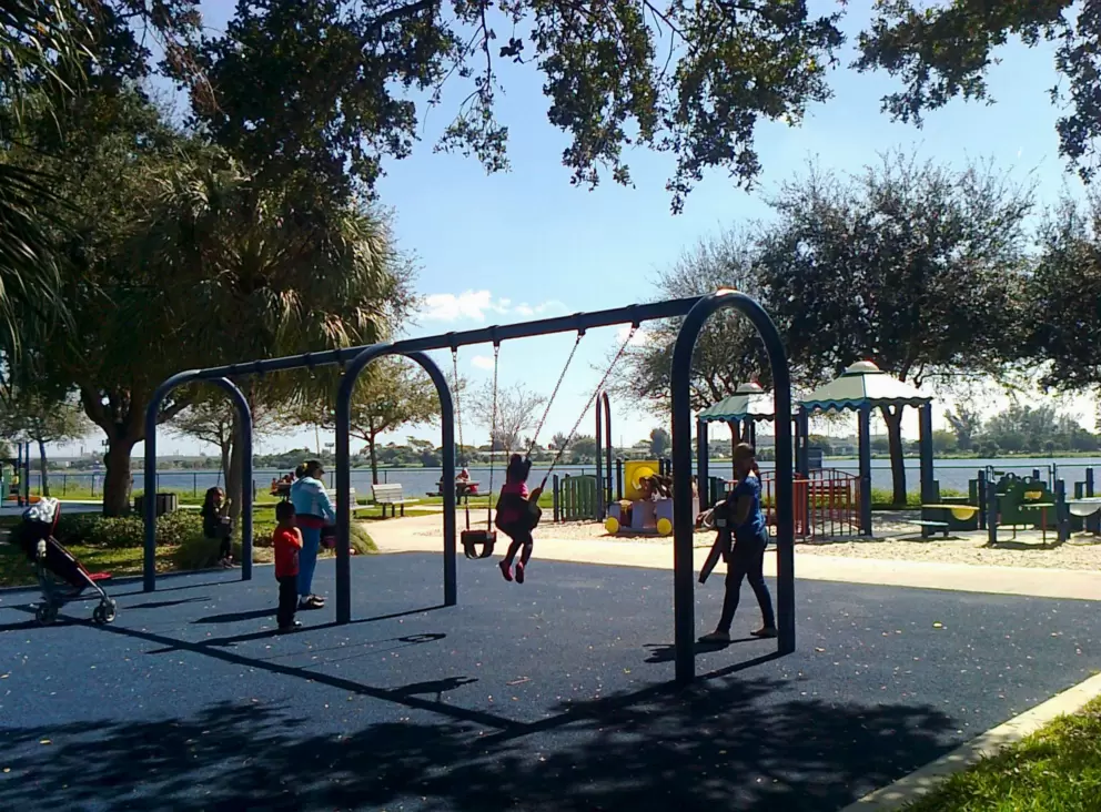Swings with a view of the lake.