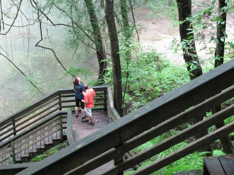 Hikers nearing the bottom of the sink.