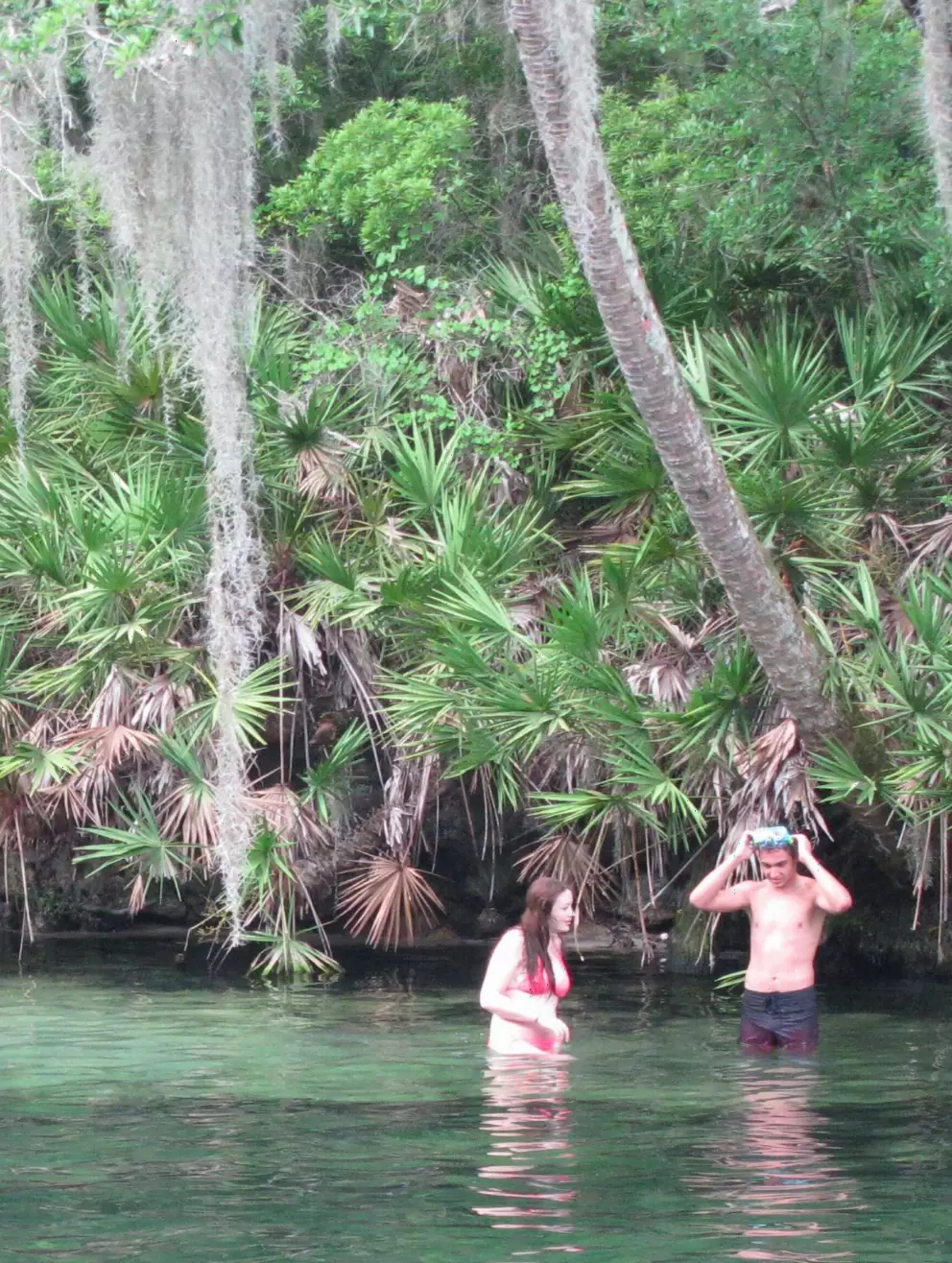 A couple in the beautiful water.