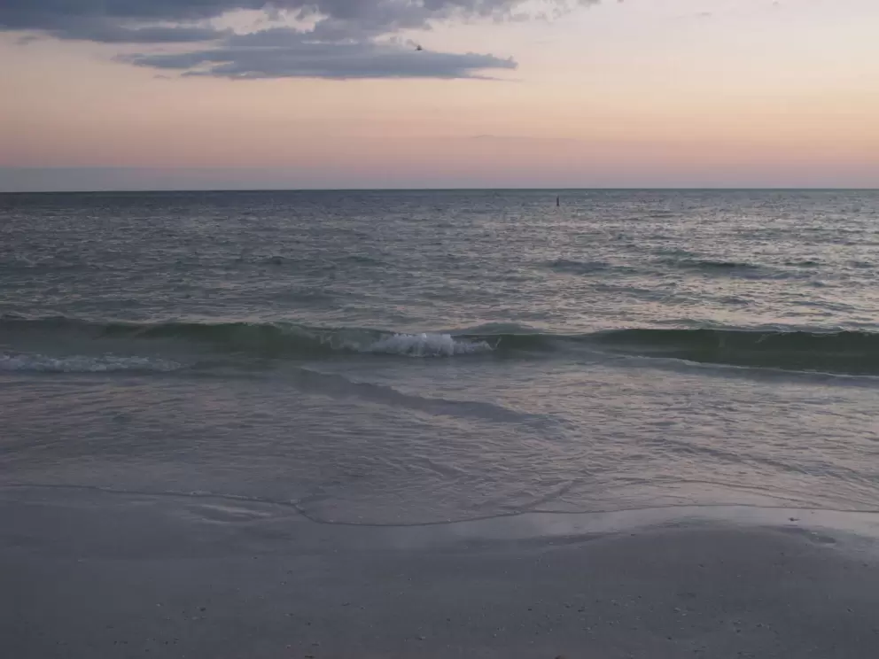 Wave and sky at dusk.