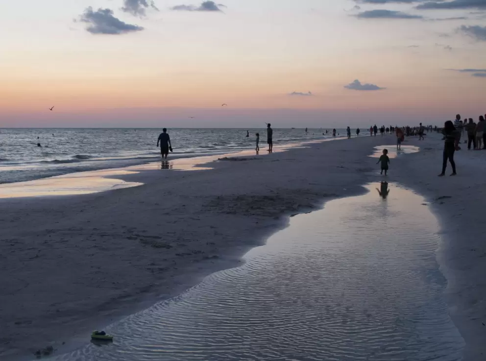 Pool of water to play in at the shore.