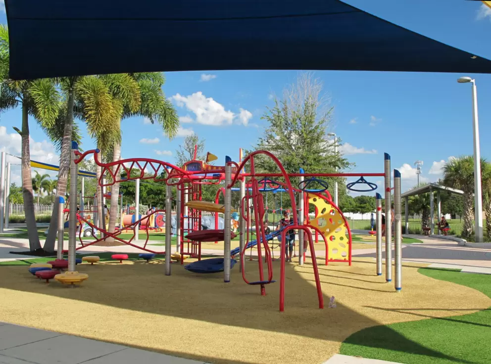 Shade canopies are dotted about the playground.