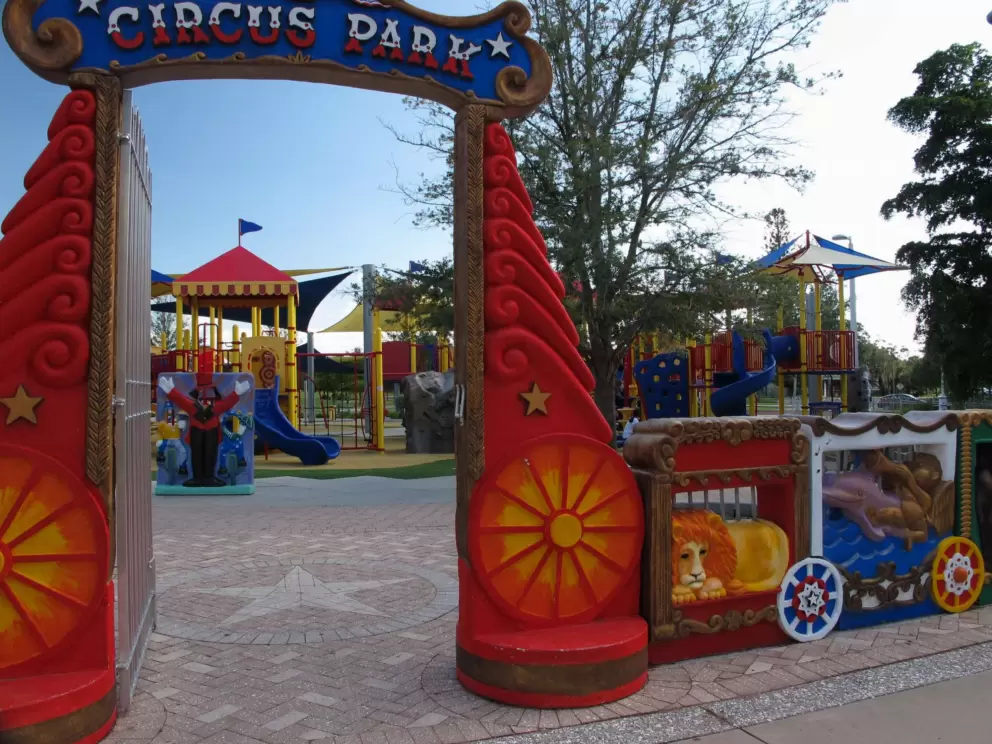 Looking in at the playground through the gate.