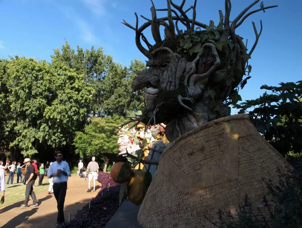 Saturday visitors check out the Four Seasons sculptures.
