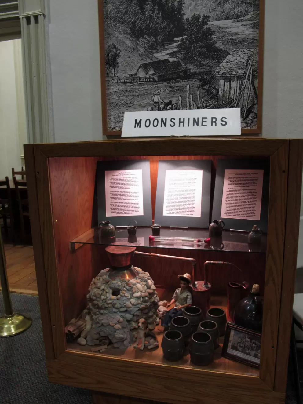 Exhibit on moonshiners in the Gold Museum.