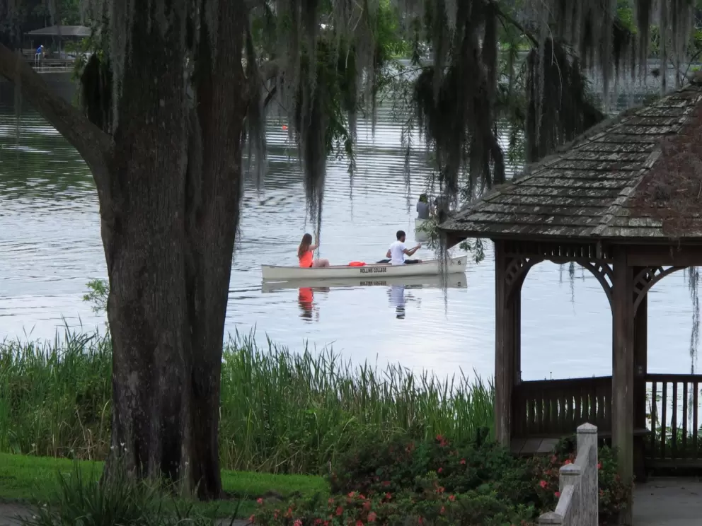 Students row on Lake Virginia.