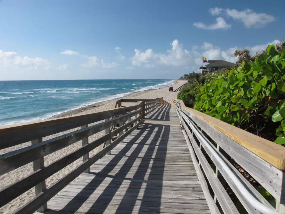 Boardwalk to the sand at the northernmost parking lot, and lifeguard shack.