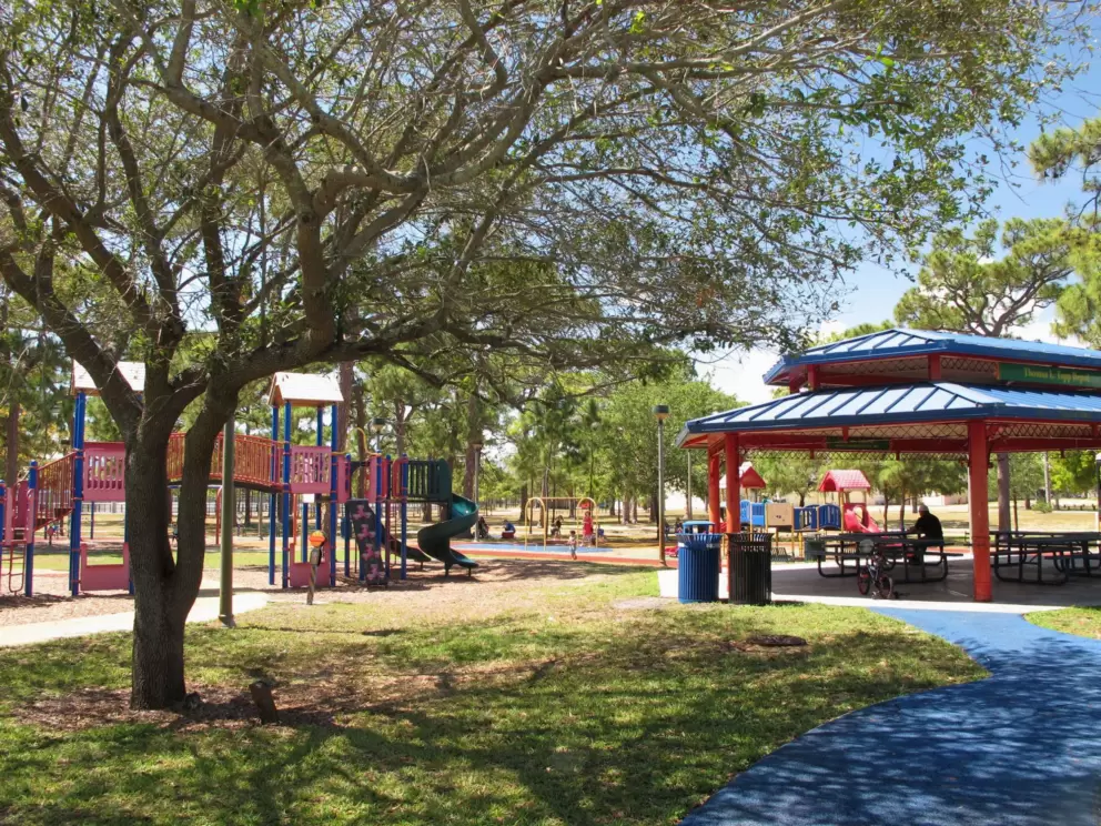 Large gazebo with picnic tables, and playground.