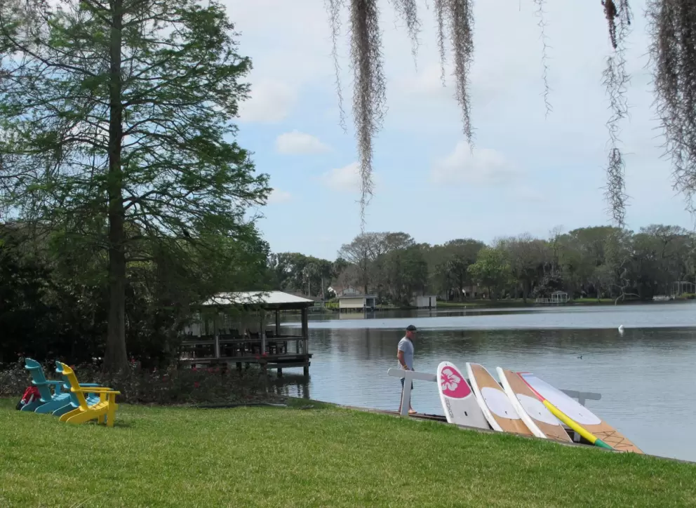Colorful adirondack chairs and paddle boards!