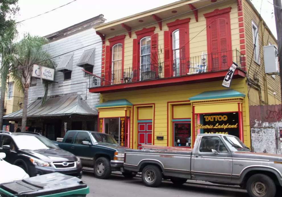 Red and yellow historic building on Frenchmen Street.