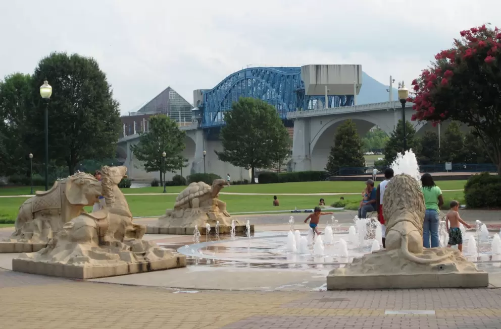 Splash pad, and blue bridge behind.