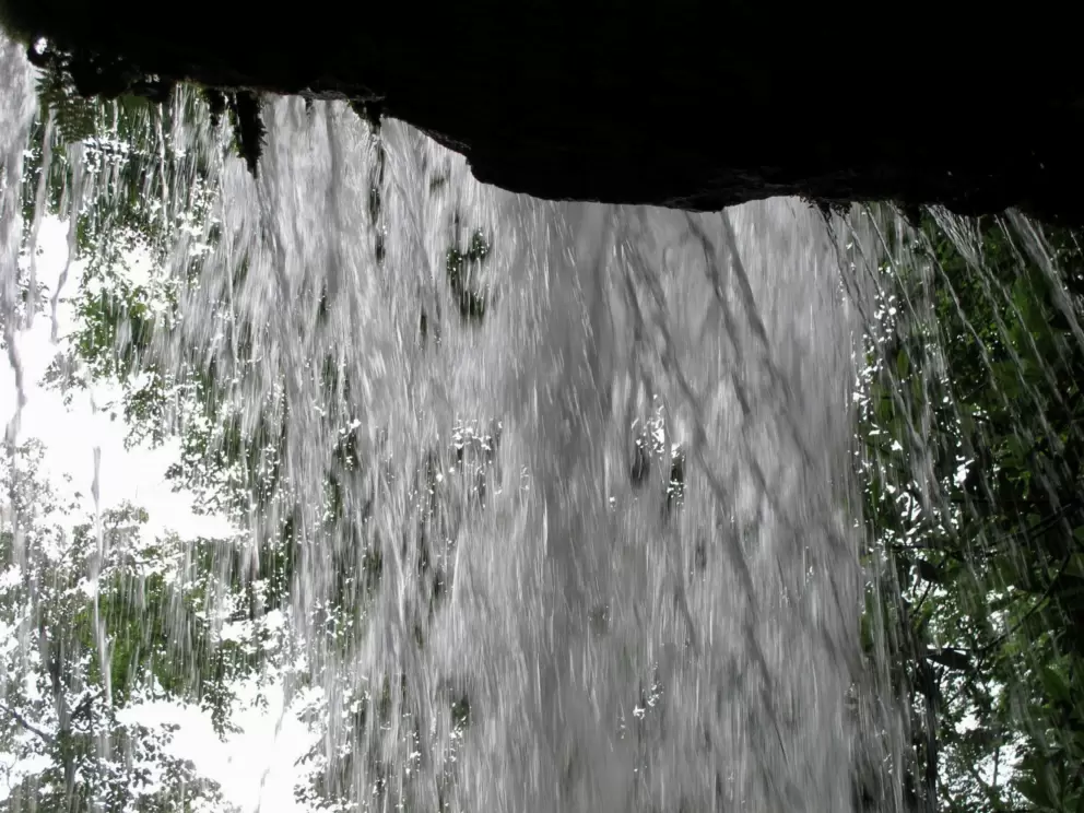 Behind the waterfall!